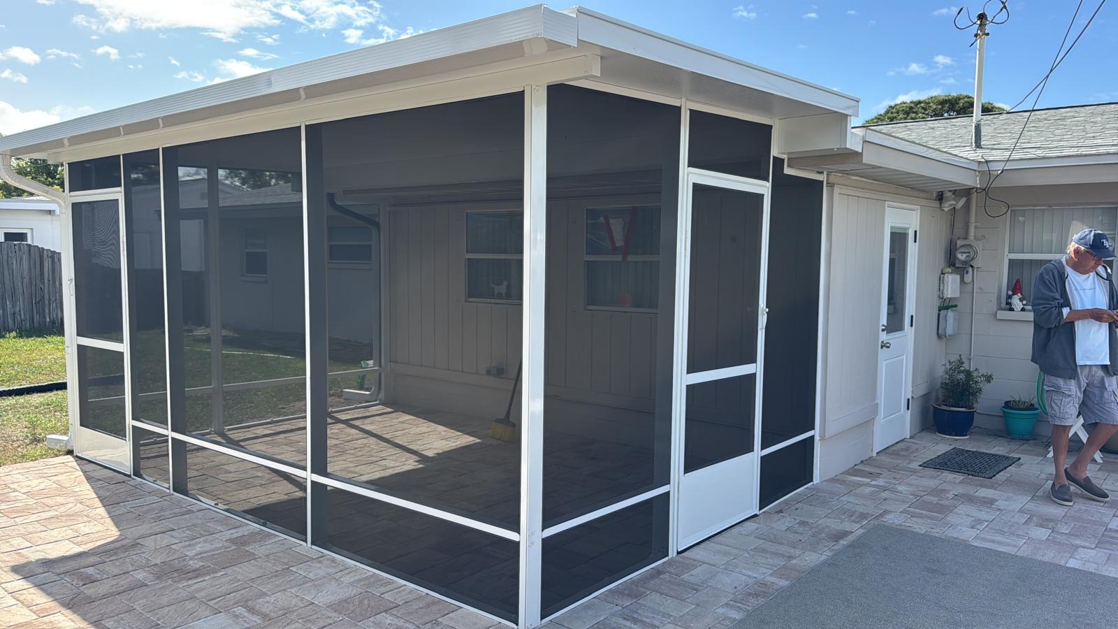 Custom screen room with paver patio in Tampa Bay, Florida